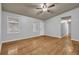 Hardwood floors and ceiling fan in living room at 280 Belmont Farms Dr, Ellenwood, GA 30294