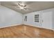 Hardwood floors and ceiling fan in living room at 280 Belmont Farms Dr, Ellenwood, GA 30294