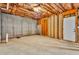 Unfinished basement with exposed framing and brick walls at 415 Gresham Dr, Stockbridge, GA 30281