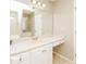 Bright bathroom with vanity, sink, and mirror at 415 Gresham Dr, Stockbridge, GA 30281