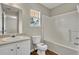 Bathroom with vanity, toilet, and tub shower at 415 Gresham Dr, Stockbridge, GA 30281