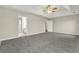 Large bedroom with carpet flooring and access to bathroom at 415 Gresham Dr, Stockbridge, GA 30281