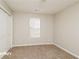 Well-lit bedroom featuring neutral walls and carpet at 415 Gresham Dr, Stockbridge, GA 30281