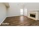 Spacious living room featuring a fireplace and hardwood floors at 415 Gresham Dr, Stockbridge, GA 30281