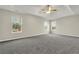 Spacious main bedroom with carpet and multiple windows at 415 Gresham Dr, Stockbridge, GA 30281