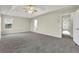 Large main bedroom with carpet and access to bathroom at 415 Gresham Dr, Stockbridge, GA 30281