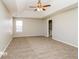 Spacious main bedroom with ceiling fan and carpet flooring at 415 Gresham Dr, Stockbridge, GA 30281