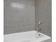 Basement bathroom with a shower and tub at 4179 White Rd, Snellville, GA 30039