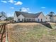 Large backyard with spacious patio and plenty of green space at 43 Harmony Woods Dr, Dallas, GA 30157