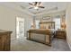 Spacious main bedroom with ceiling fan and ensuite bathroom access at 43 Harmony Woods Dr, Dallas, GA 30157