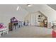 Large playroom with vaulted ceiling and ample natural light at 43 Harmony Woods Dr, Dallas, GA 30157