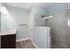 Bathroom boasts a large shower and double vanity at 1559 Walker Ave, College Park, GA 30337