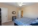 Bedroom with a double bed, ceiling fan, and a built-in closet at 1559 Walker Ave, College Park, GA 30337