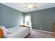 Cozy bedroom with a full bed and ceiling fan at 1559 Walker Ave, College Park, GA 30337