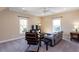 Bright bonus room with cozy seating area and plenty of natural light at 1559 Walker Ave, College Park, GA 30337