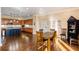 Well-lit dining area adjacent to a modern kitchen at 1559 Walker Ave, College Park, GA 30337