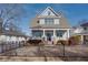 Two-story craftsman home with gray siding, brick accents, and a charming front porch at 1559 Walker Ave, College Park, GA 30337