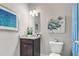 Bathroom featuring a modern vanity, granite countertop, and decorative wall art at 1716 Prelude, Marietta, GA 30067