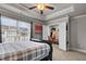 Relaxing bedroom with a tray ceiling, closet and natural light at 1716 Prelude, Marietta, GA 30067