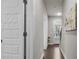 Bright hallway with hardwood floors and modern doors at 1716 Prelude, Marietta, GA 30067