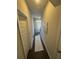 Bright hallway with neutral walls and dark hardwood floors at 1716 Prelude, Marietta, GA 30067