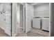 Convenient laundry room features a washer, dryer and wire shelving at 1716 Prelude, Marietta, GA 30067