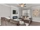 Living room with sectional sofa, fireplace, and hardwood floors at 1716 Prelude, Marietta, GA 30067