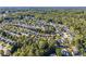 Aerial view of a large suburban neighborhood with many homes at 1855 Charleston Oak Cir, Lawrenceville, GA 30043