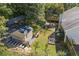 Aerial view of house and backyard with shed at 1855 Charleston Oak Cir, Lawrenceville, GA 30043