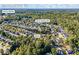 Aerial view of home in a neighborhood near Rock Springs Rd and Sunny Hill Rd at 1855 Charleston Oak Cir, Lawrenceville, GA 30043