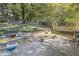 Large backyard with patio and garden at 1855 Charleston Oak Cir, Lawrenceville, GA 30043