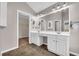 Elegant bathroom with double vanity and walk-in closet at 1855 Charleston Oak Cir, Lawrenceville, GA 30043