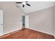 Bedroom with hardwood floors and ceiling fan at 1855 Charleston Oak Cir, Lawrenceville, GA 30043