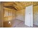 Unfinished interior of a shed with wood walls and shelves at 1855 Charleston Oak Cir, Lawrenceville, GA 30043