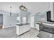 Spacious kitchen with large island and white shaker cabinets at 1855 Charleston Oak Cir, Lawrenceville, GA 30043