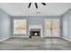 Living room with fireplace and access to the kitchen at 1855 Charleston Oak Cir, Lawrenceville, GA 30043