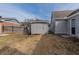 Partially fenced backyard with plenty of space and additional storage building at 1890 Old Concord Se Dr, Covington, GA 30016