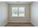 Cozy bedroom with a large window and a closet at 1890 Old Concord Se Dr, Covington, GA 30016