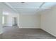 Spacious living room with wood floors and white trim throughout the space at 1890 Old Concord Se Dr, Covington, GA 30016