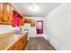 Classic kitchen with wood cabinets and vinyl flooring at 2257 Polar Rock Sw Ave, Atlanta, GA 30315