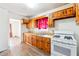 Cozy kitchen featuring wood cabinets and a gas range at 2257 Polar Rock Sw Ave, Atlanta, GA 30315