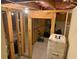 Unfinished basement with framed walls and storage space at 5615 Cowles Cir, Suwanee, GA 30024