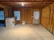 Unfinished basement featuring framed walls and a door at 5615 Cowles Cir, Suwanee, GA 30024