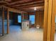 Unfinished basement with framed walls and windows at 5615 Cowles Cir, Suwanee, GA 30024