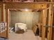 Unfinished basement area with some storage items at 5615 Cowles Cir, Suwanee, GA 30024