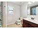 Clean bathroom with tiled floors and a vanity at 5615 Cowles Cir, Suwanee, GA 30024