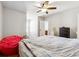 Bedroom with ceiling fan and access to a bathroom at 5615 Cowles Cir, Suwanee, GA 30024