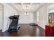 Formal dining room with hardwood floors, coffered ceiling, and chandelier at 5615 Cowles Cir, Suwanee, GA 30024