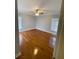 Hardwood floors and ceiling fan in spacious bedroom at 95 Twin Lakes Dr, Carrollton, GA 30116