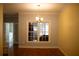 Bright dining room with hardwood floors and a chandelier at 95 Twin Lakes Dr, Carrollton, GA 30116